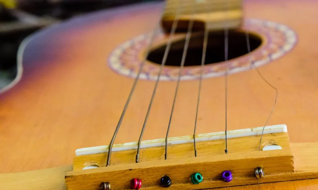 inconsistent-branding-broken-guitar-string