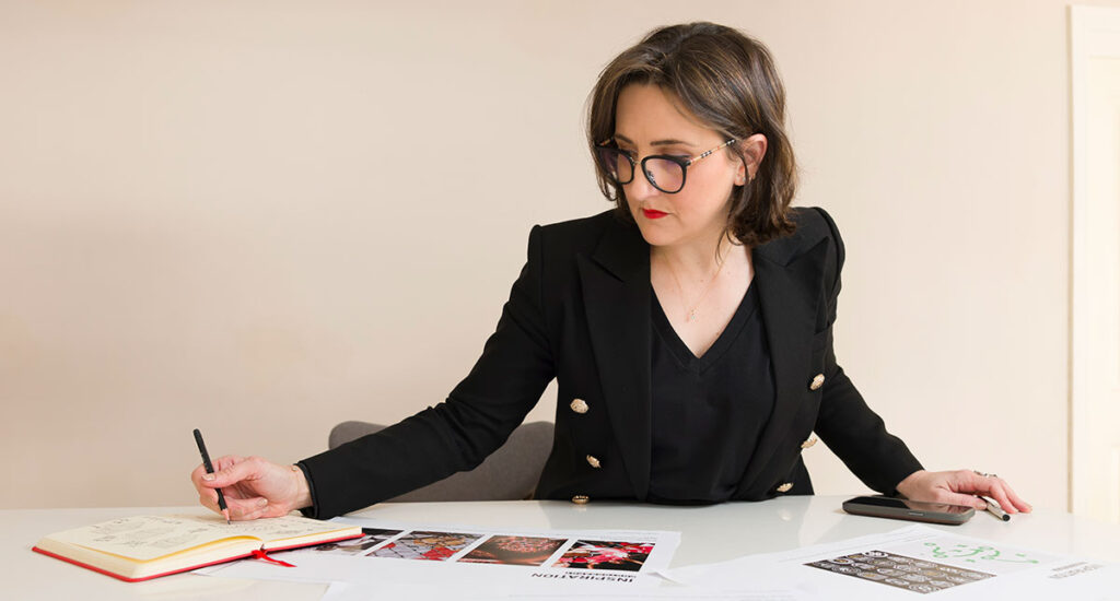 Nat Gatt reviewing hand-sketched concepts and mood boards during the brand strategy process — Nat Gatt Brand Studio